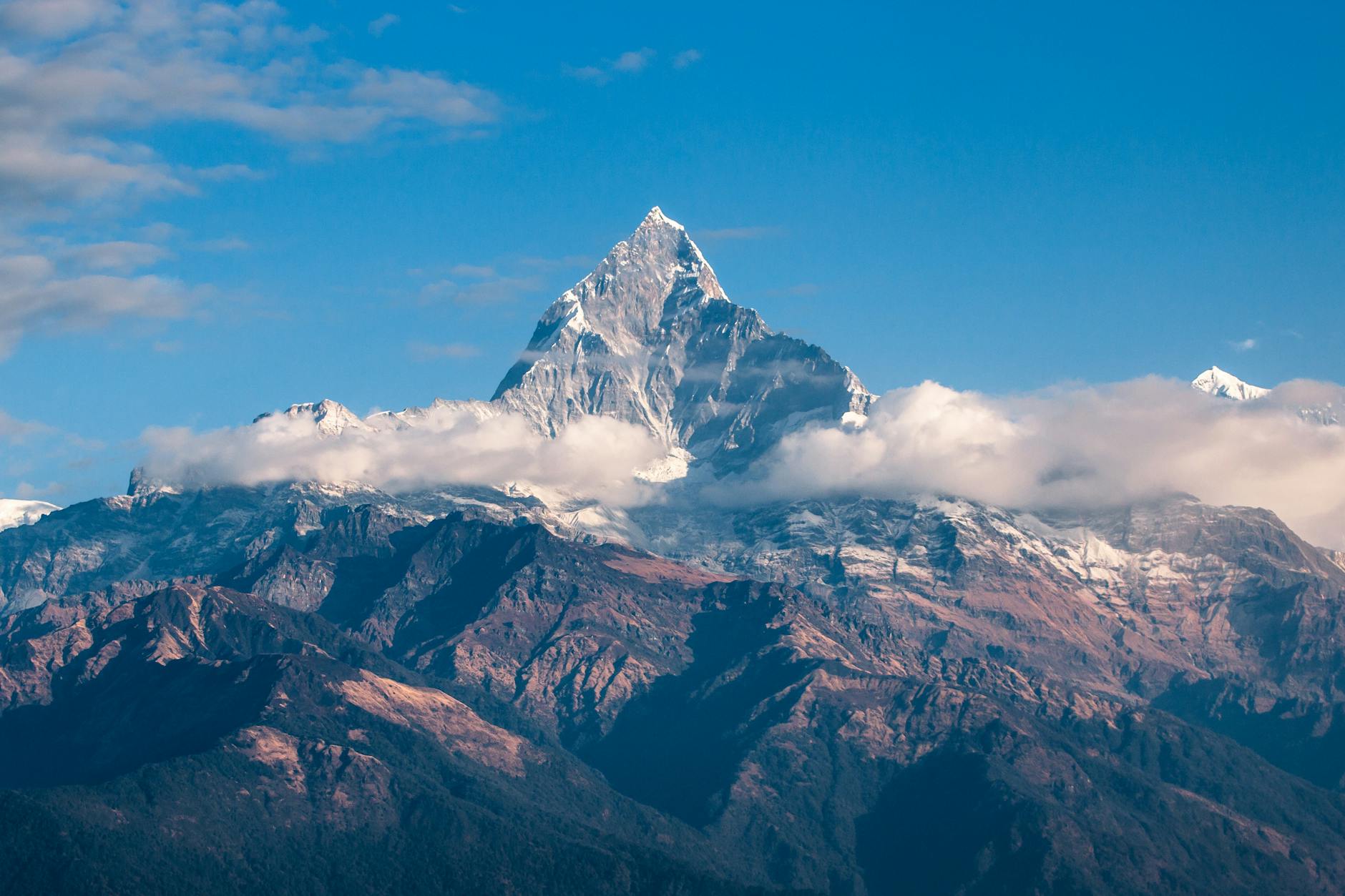 A mountain against a blue sky.
